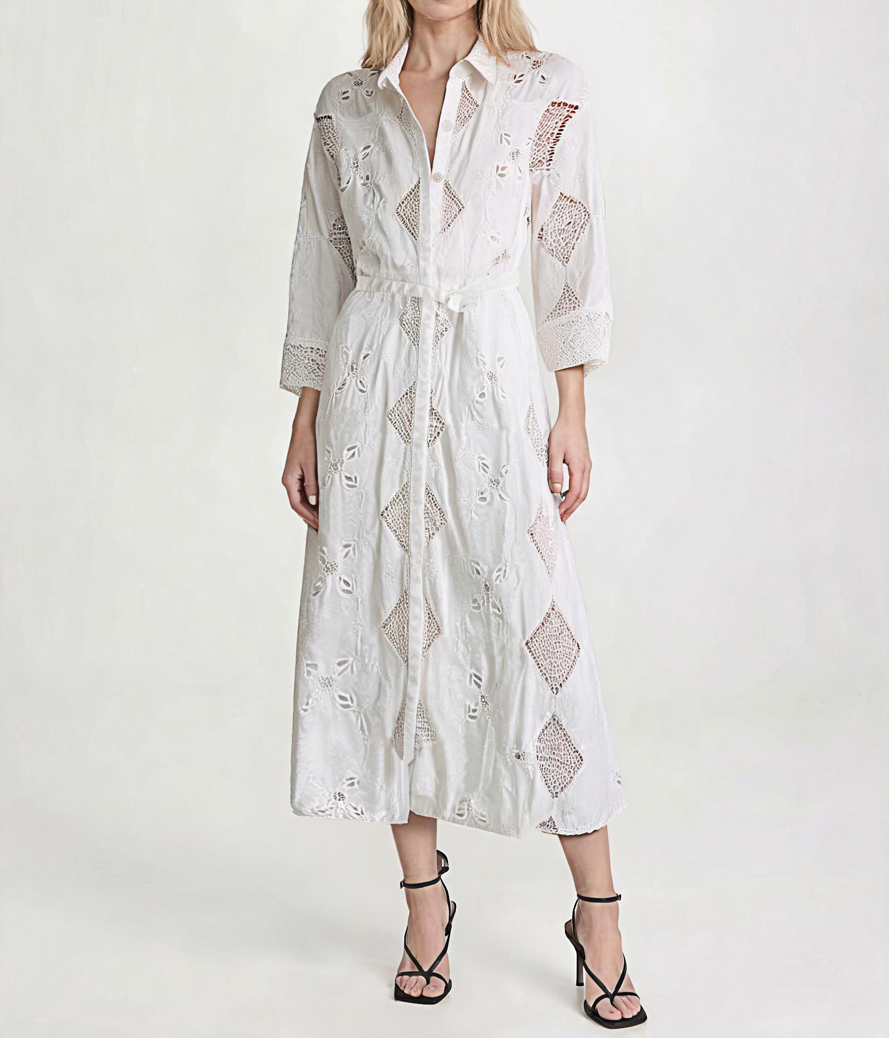Garment before retouch, with creases and uncorrected drape.